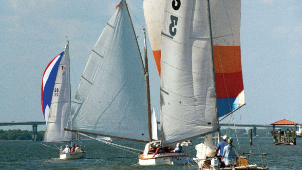 Three classic boats head toward the finish line at Beaufort Yacht & Sailing Club—from left, Sam “Woody” Norwood’s Myrdie III, Roy Crocker’s True Love and Buddy Sharpton’s Three Part Harmony