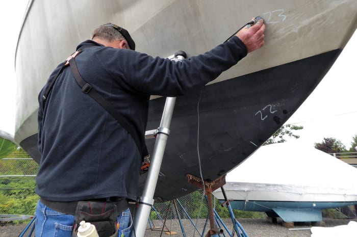 Surveying an aluminum hull: no worries about osmotic blistering here! 