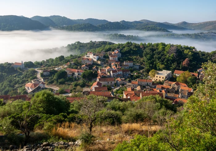 The town of Lastovo sits nestled among the hills 