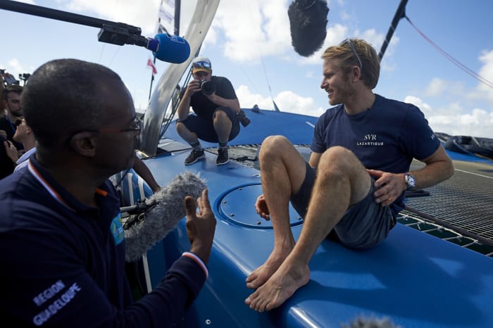 Francois Gabart is interviewed after arriving in Guadeloupe just three hours after Caudrelier