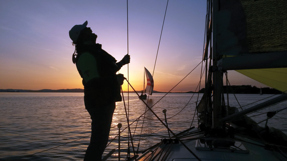 Trimming the chute as the sun goes down on a quiet evening off Vallejo, California, near San Francisco Bay. Photo by SAIL reader Victor Beltran.