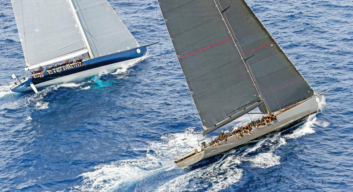 The 100ft WallyCentos Magic Carpet³ (left) and Open Season battle to windward at the 2015 Maxi Yacht Rolex Cup. Photo courtesy of Rolex SA