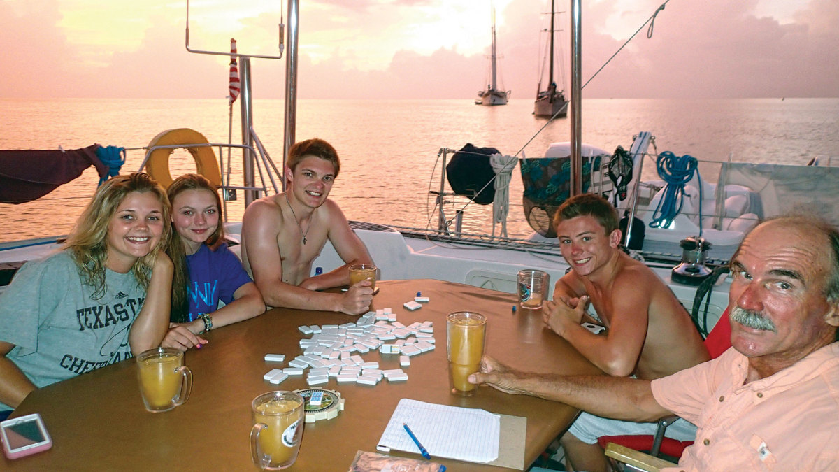 Rum punch at sunset and dominoes; that’s how they do it on Wildcat