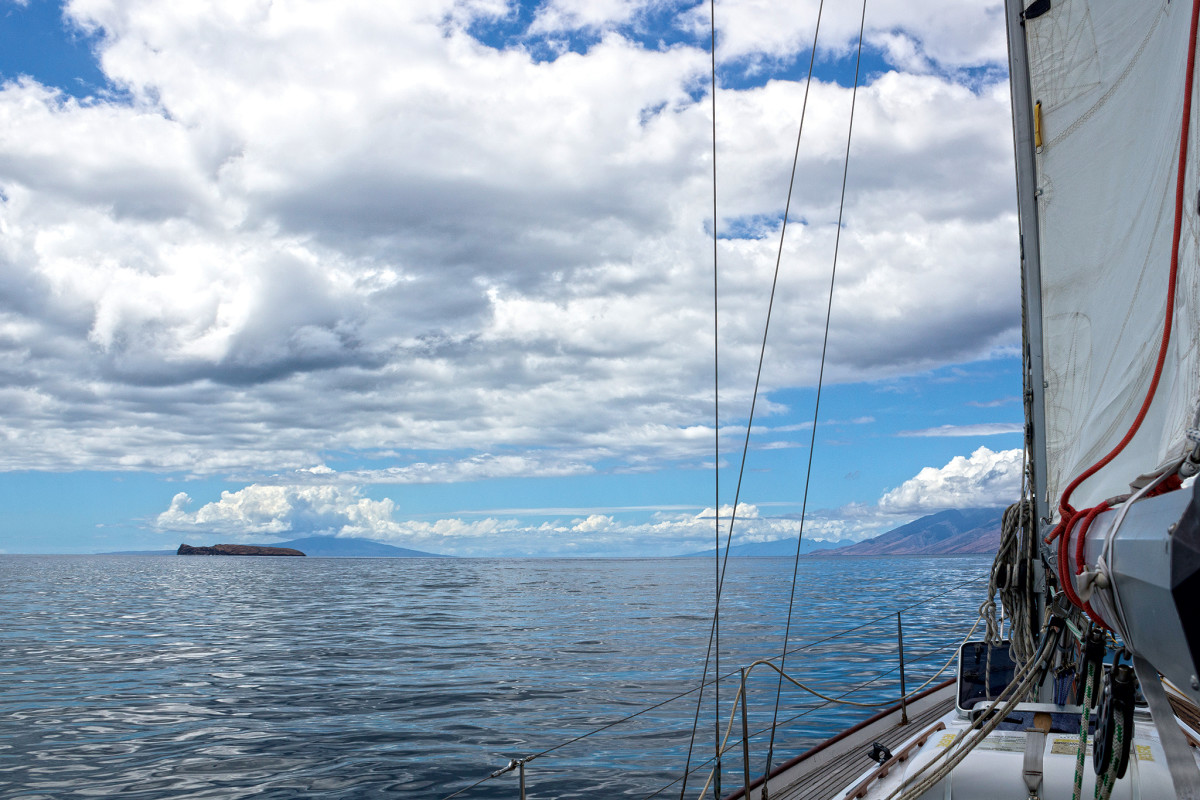 Motoring through a calm toward Molokini island