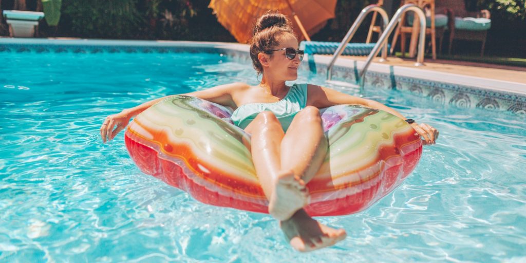 Woman Relaxing on a Pool Float