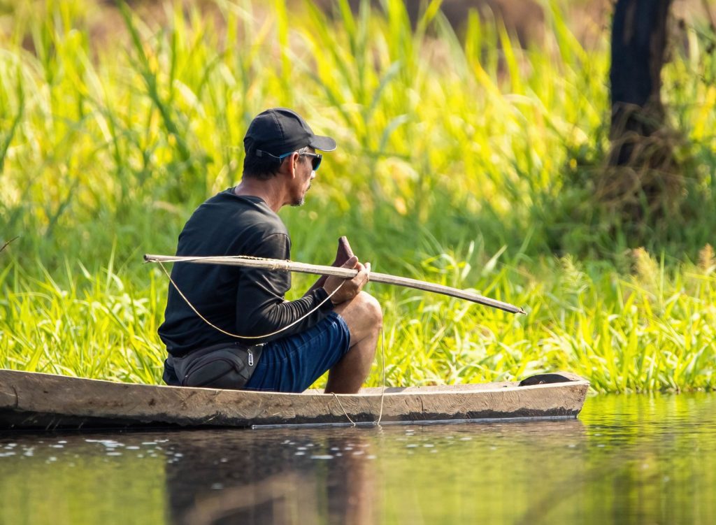 Man bow fishing